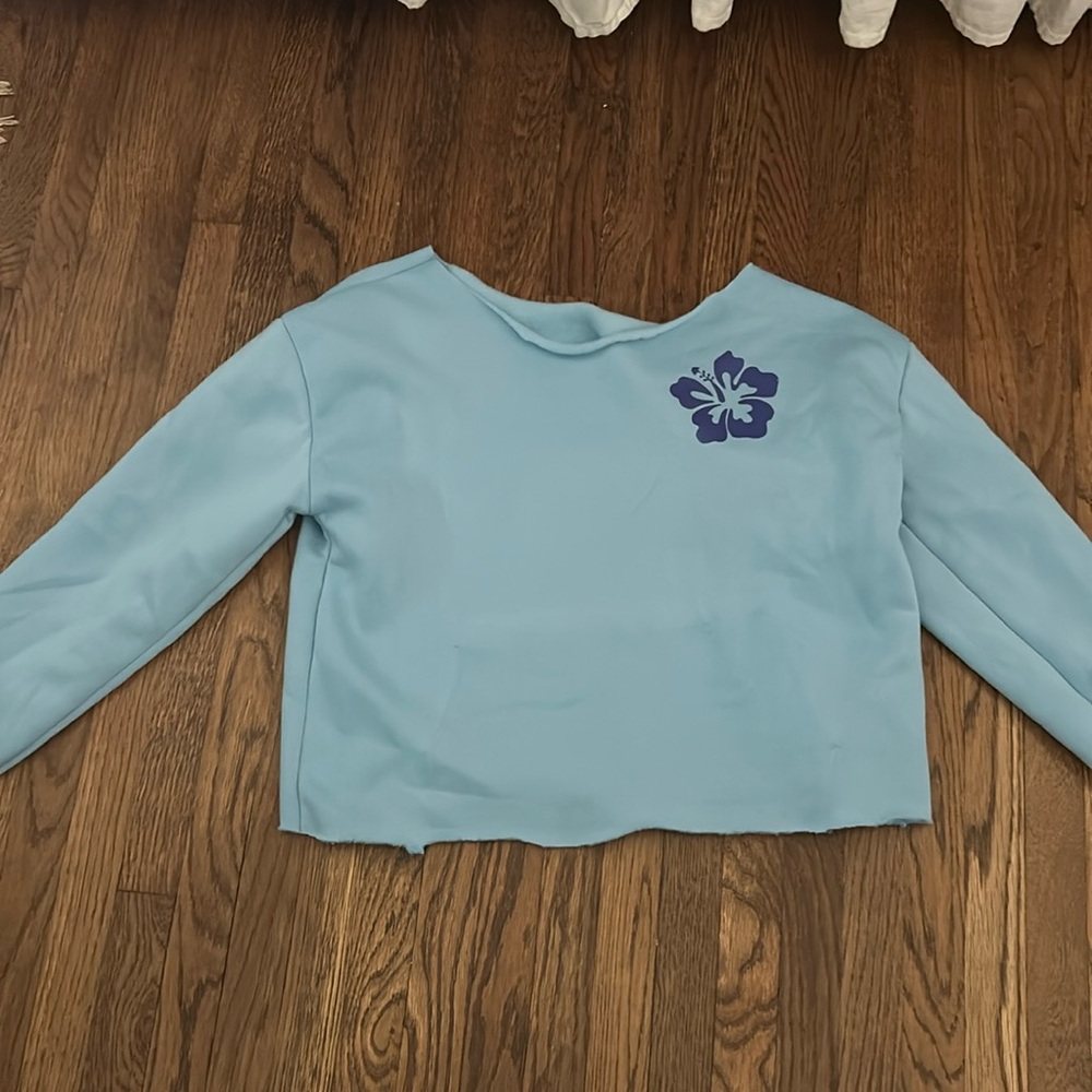 blue off the shoulder sweatshirt